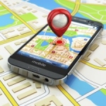 Mobile GPS navigation concept. Smartphone on map of the city,